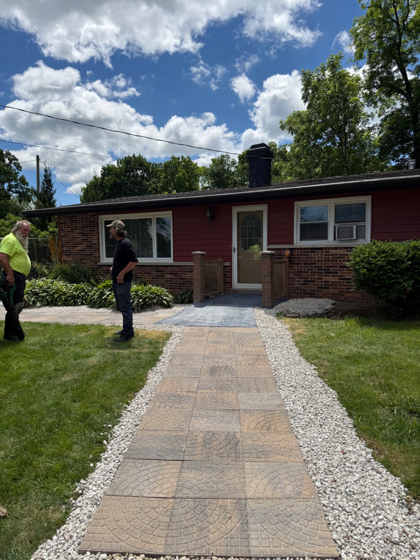 Stamped concrete walkway and entry patio installed by D&D Contracting