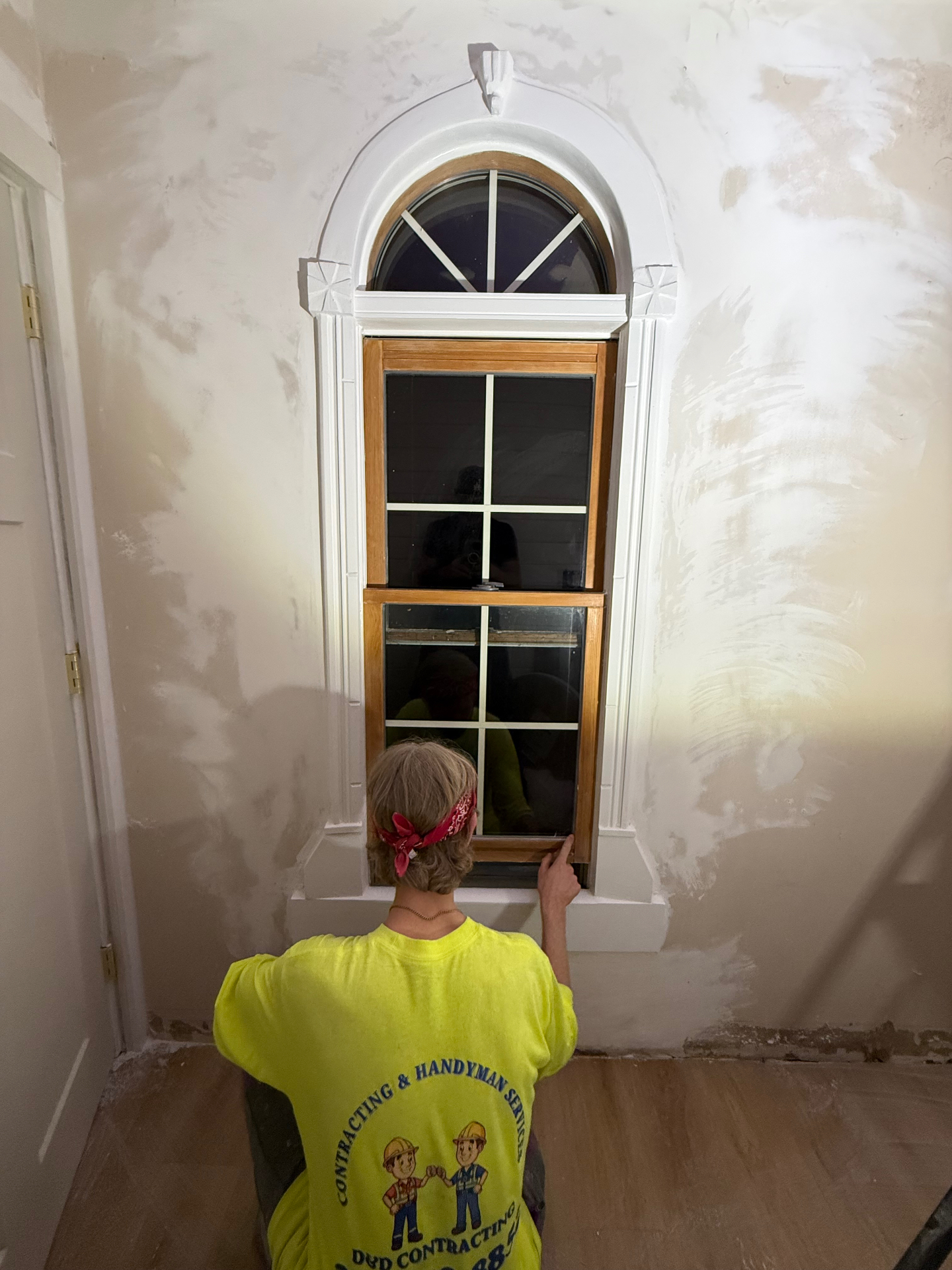 Interior arched window trim and plaster restoration by D&D Contracting